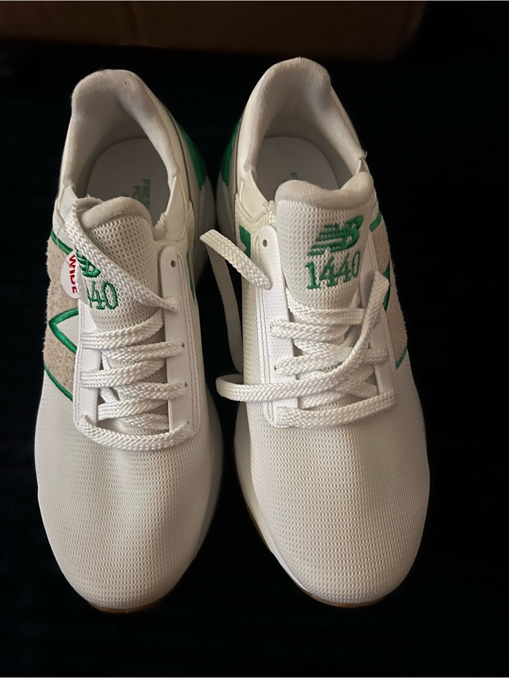 New Balance 1440 White and Green Women's or Men’s Sneakers sold elsewhere $198 .